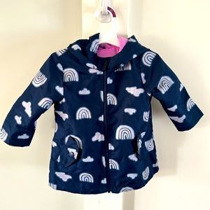 Carters rainbow color changing Rain Jacket. Size 18m.